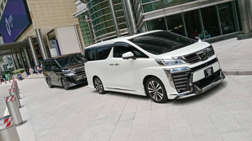 Professional chauffeur providing premium luxury MPV service