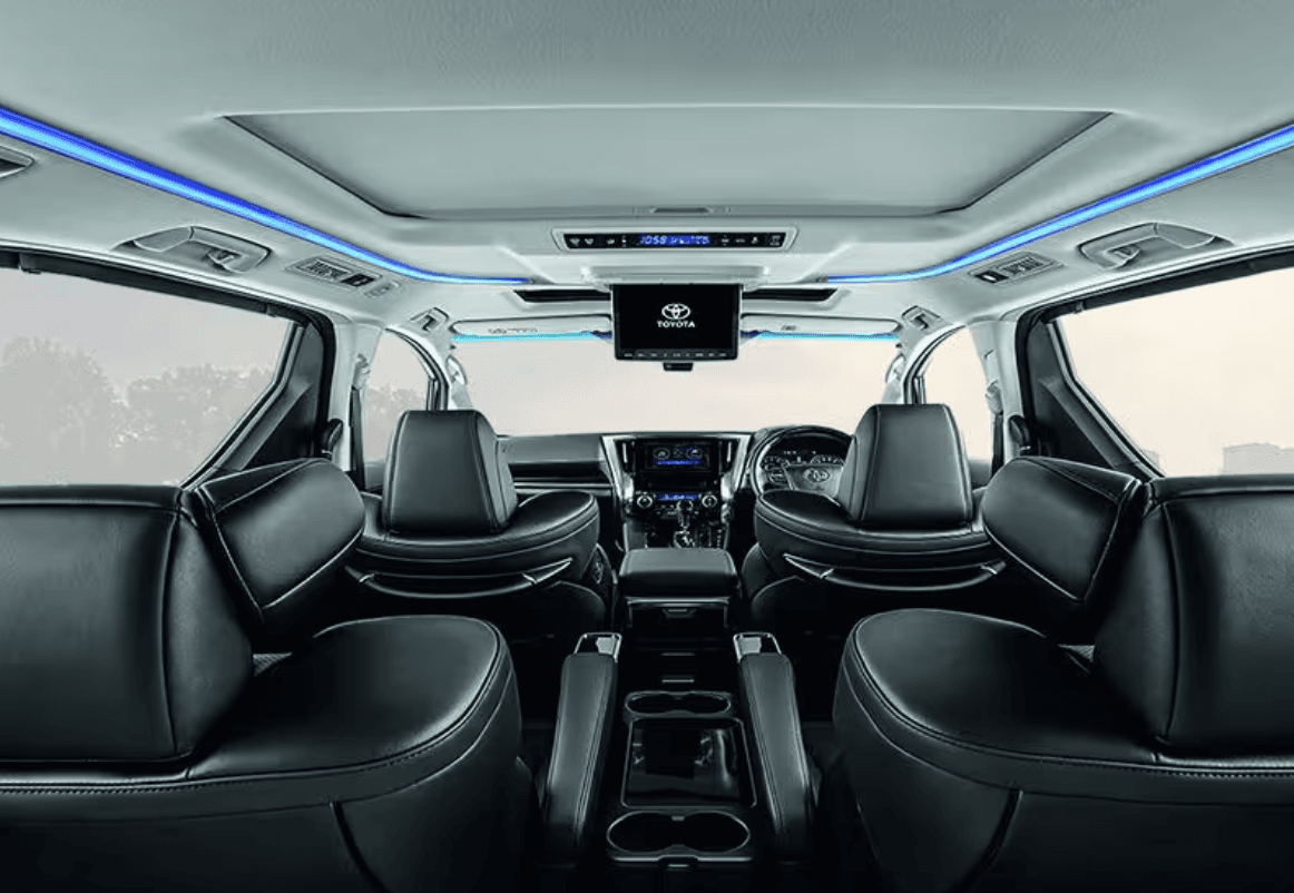Luxury MPV interior showing premium leather seats and spacious cabin